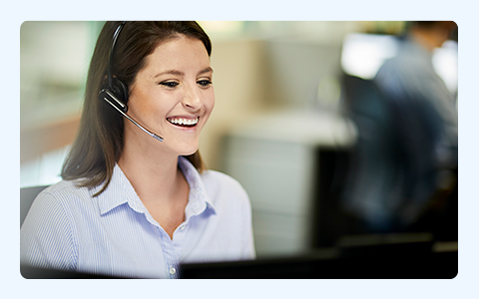 Woman With Headset Talking in Office.